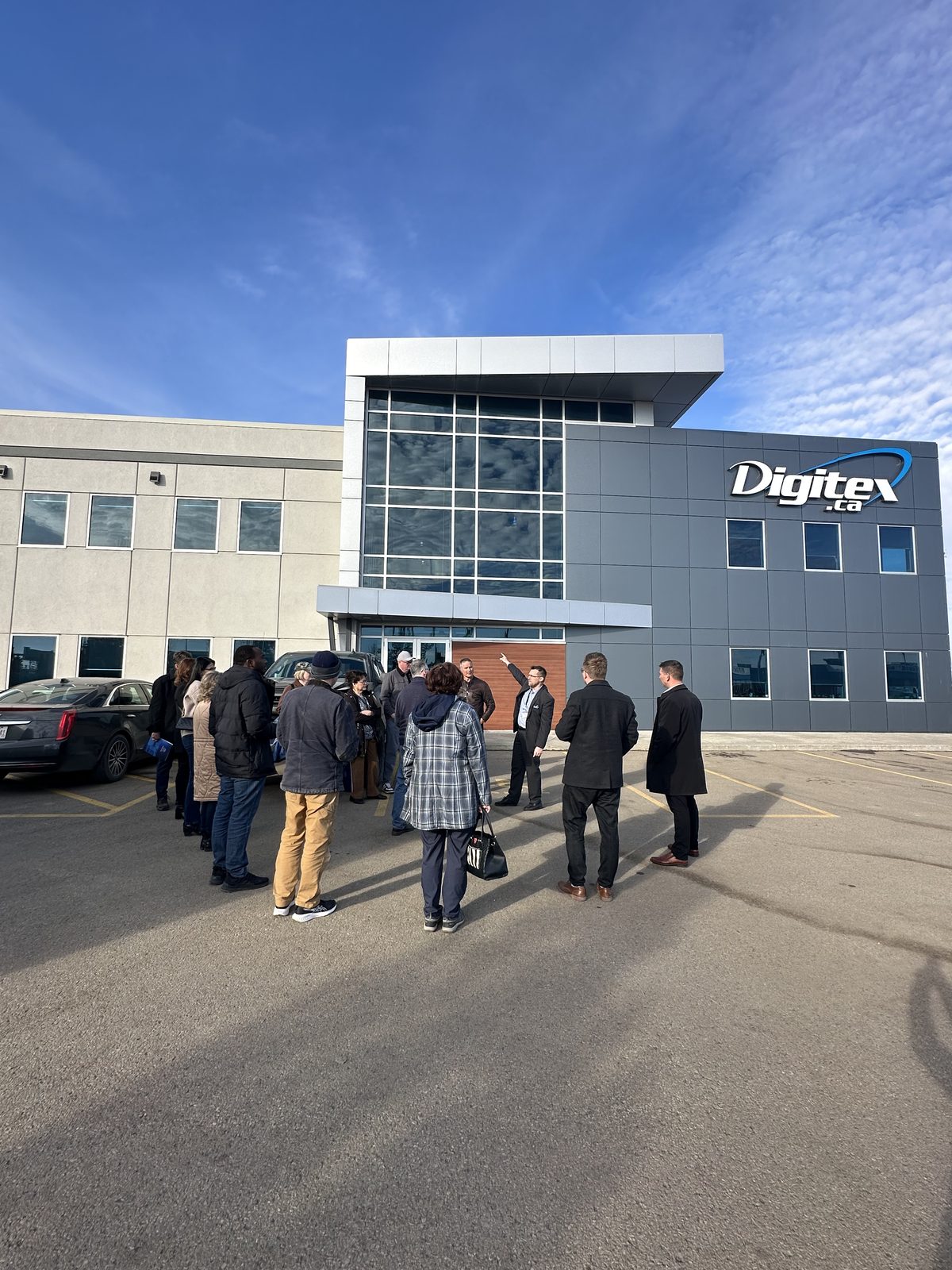 Investors gathering outside Digitex industrial facility in Red Deer